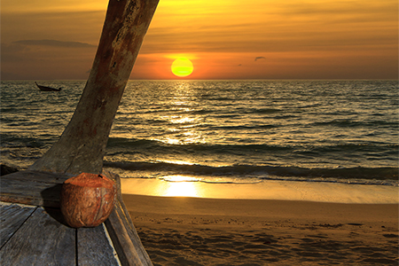 wood boat on the beach at Holidays sunny tranquil paradise beach