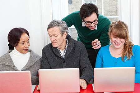 People taking computer class together