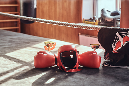 There are prizes on sunny boxing ring - cups and tshirt, and also equipment like red gloves and helm