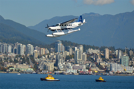 seaplane getting ready for landing in North Vancouver Harbor, Canada