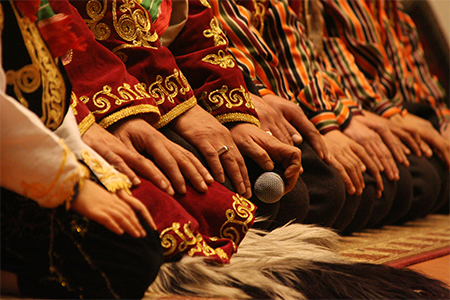 a group of people in folkloric clothes
