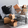 concept art: shopping cart and boxes on the laptop