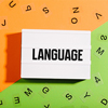 Language text in light box on duo color orange and green background with random letters