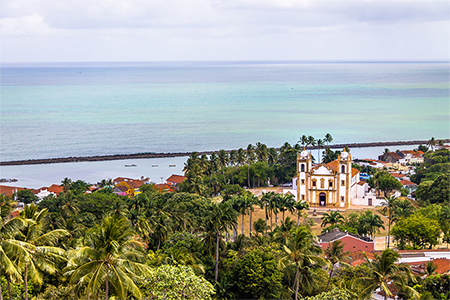 Aerial panoramic view of a beautiful city near coast