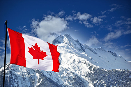 Canadian flag and beautiful mountain landscape