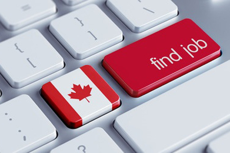 white keyboard with two special keys - canada flag and all red with 