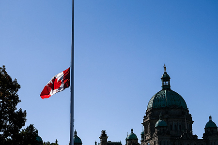 canada flag at half mast - Parliament Buildings in Victoria and Provincial Government Buildings in M