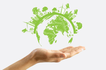 Hand with illustrated planet earth showing eco concepts