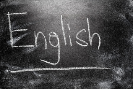 English written on blackboard with chalk
