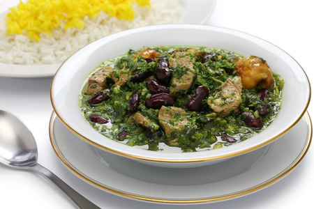 Ghormeh sabzi on white and gold plate