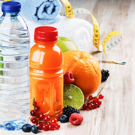 Image of healthy snacks, water, and measuring tape on counter