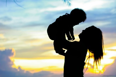 Mother & Baby Silhouette in sunset time (child)