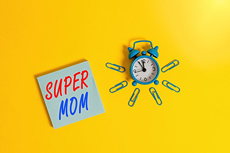 Conceptual hand writing showing Super Mom. Concept meaning a mother who can combine childcare and fu