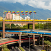 Multi level highway in center of Caracas Venezuela with national flags
