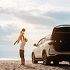 Happy Family with car travel road trip. summer vacation in car in the sunset, Dad, mom and daughter 