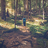 Female hiker on the Upper Myra Falls Trail, Strathcona Provincial Park, Vancouver Island, British Co