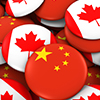 China and Canada Badges Background - Pile of Chinese and Canadian Flag Buttons 3D Illustration