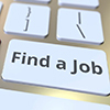 FIND A JOB text and flag of Canada on the buttons on the computer keyboard. Employment related conce