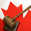 gavel on top of canada flag