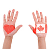 hands showing heart and canada flag