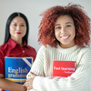 Curly red-haired woman holding English learning book