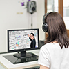 woman watching virtual lecture