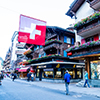 street in switzerland - flag hanging 