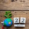 Wooden Block calendar for World Earth Day April 22, Wooden Block calendar and handmade globe on wood