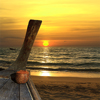 wood boat on the beach at Holidays sunny tranquil paradise beach