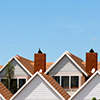 rooftops of 3 houses