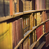 curved library shelf full of books