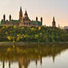 view of parliament buildings over canal