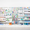 Defocused image of medicines arranged in shelves at pharmacy