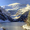 Early winter snow settles on Lake Louise, Alberta in the Canadian Rockies