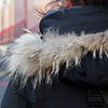back view of woman in winter jacket