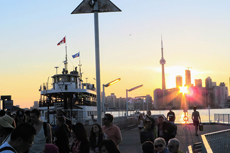 Toronto, Ontario, Canada - June 22nd, 2014: A summer evening on Toronto Islands as the sun goes down