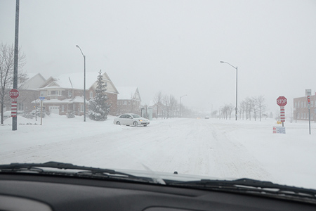 winter roads seen through windshield