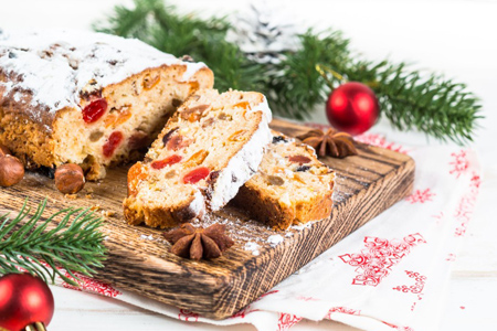 Stollen traditional Christmas fruitcake with dried fruit and nut