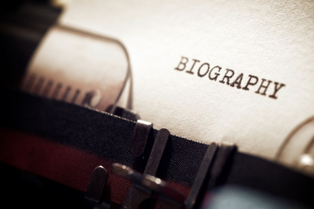 Biography word written with a typewriter.
