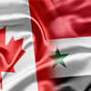 The flags of Canada and Syria