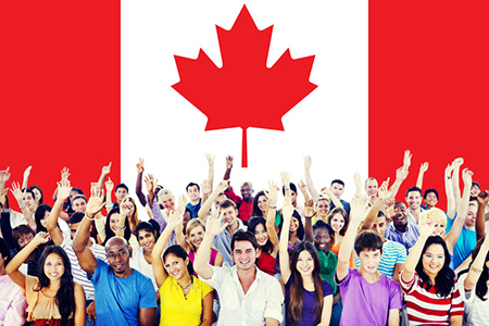 Canada flag - group of happy people raising hand