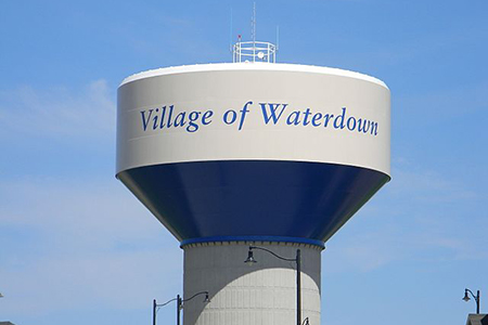 Close up of watertower. Village of Waterdown written on tower