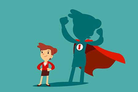 Confident businesswoman standing in front of her shadow wearing red cape as a superhero. Business am
