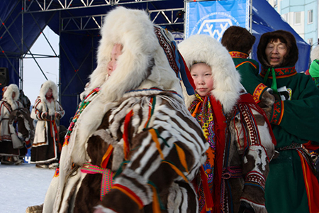 NADYM, RUSSIA - MARCH 07, 2010: Nenets women in traditional fur clothes. Nenets - Indigenous people 