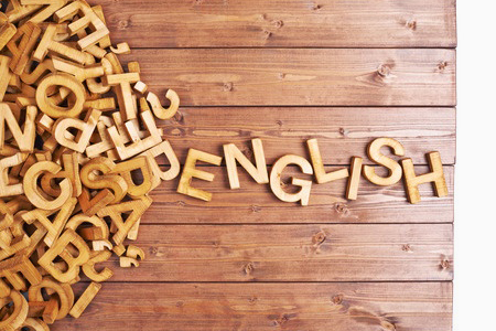 wooden block letters spelling out English