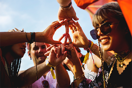 Friends Making Hands as Peace Sign Together