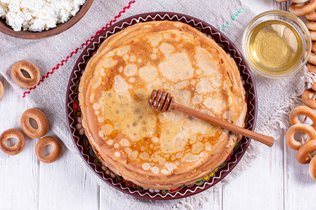 Thin homemade pancakes. Russian bliny. Maslenitsa. Rustic style, close up view