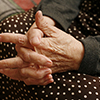 Hands of the elderly woman close-up