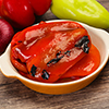 Marinated baked red bell pepper in the bowl