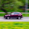 the Toyota RAV4 compact crossover moves at high speed along the street in summer. Moscow, Russia-Apr